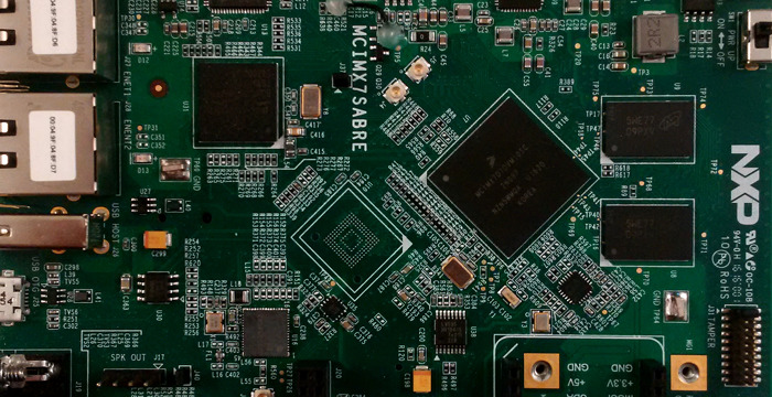Close up shot of the NXP i.MX7 Sabre development board showing the SoC BGA chip.